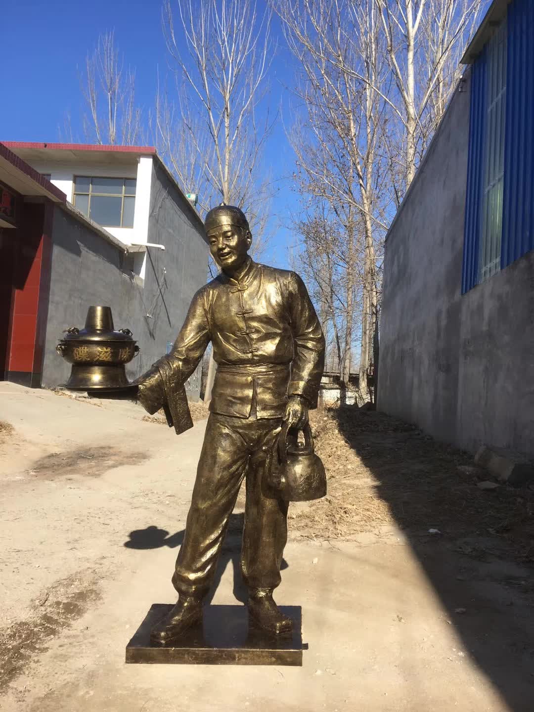 端火锅人物铜雕