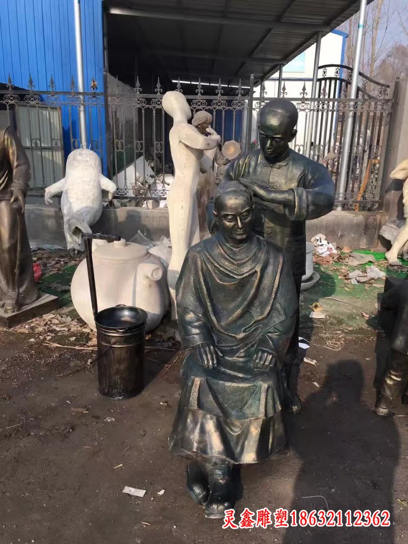 剃头发人物铜雕