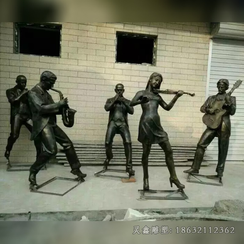 抽象人物演奏音乐校园铜雕