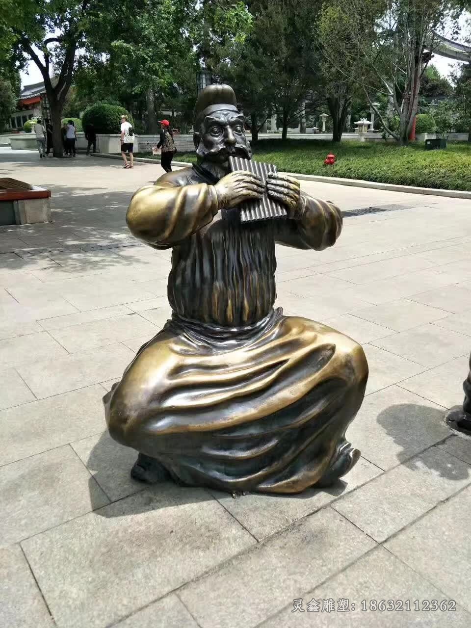 少数民族吹乐器人物铜雕