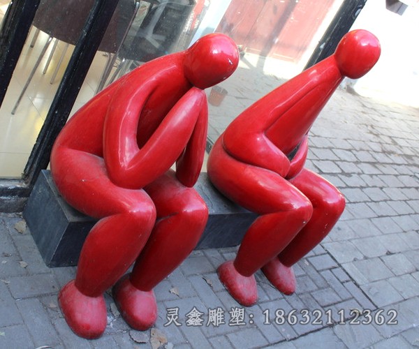 红色不锈钢抽象人物雕塑